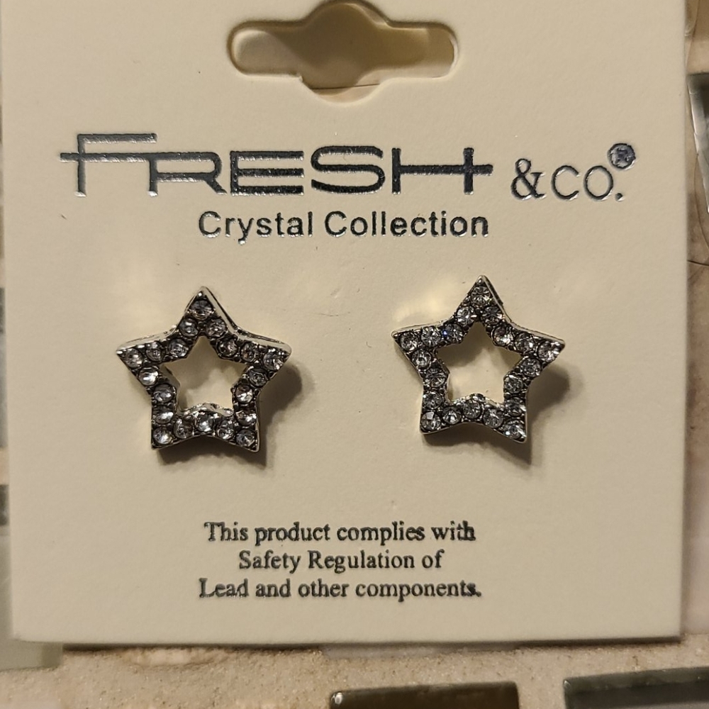 Brand new crystal star earrings